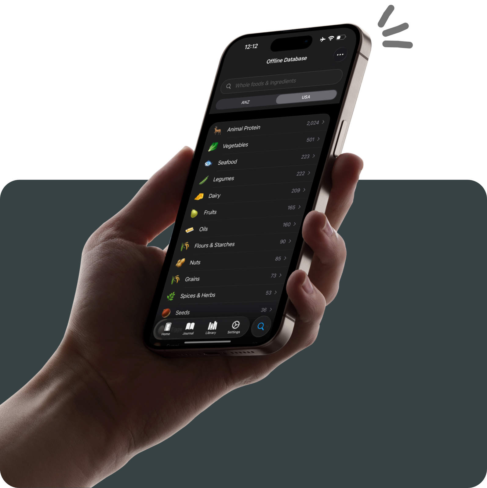 A hand holding an iPhone displaying the whole foods ingredient database
