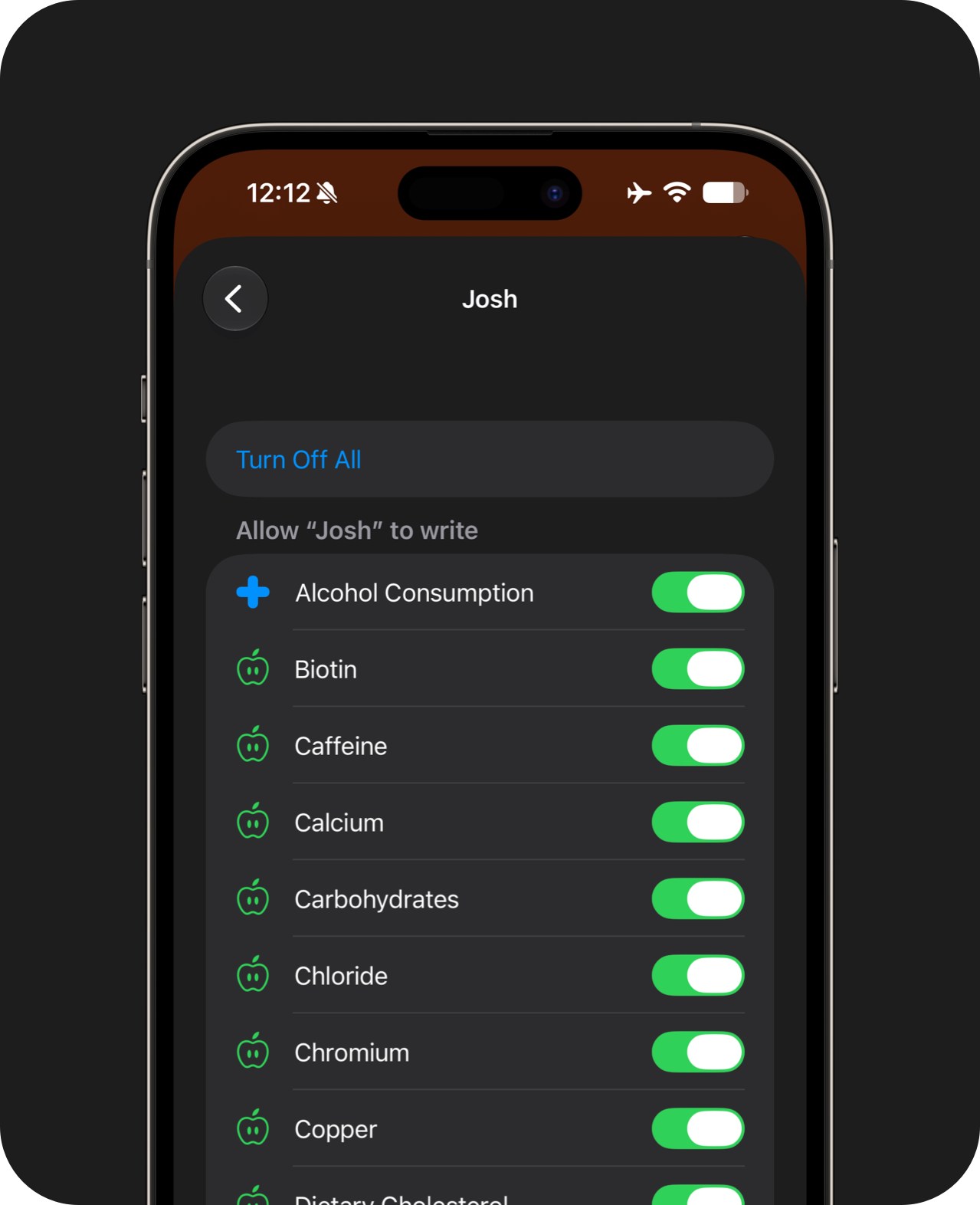 A hand holding an iPhone displaying the Apple Health section for this app, where all read and write permissions are set to active