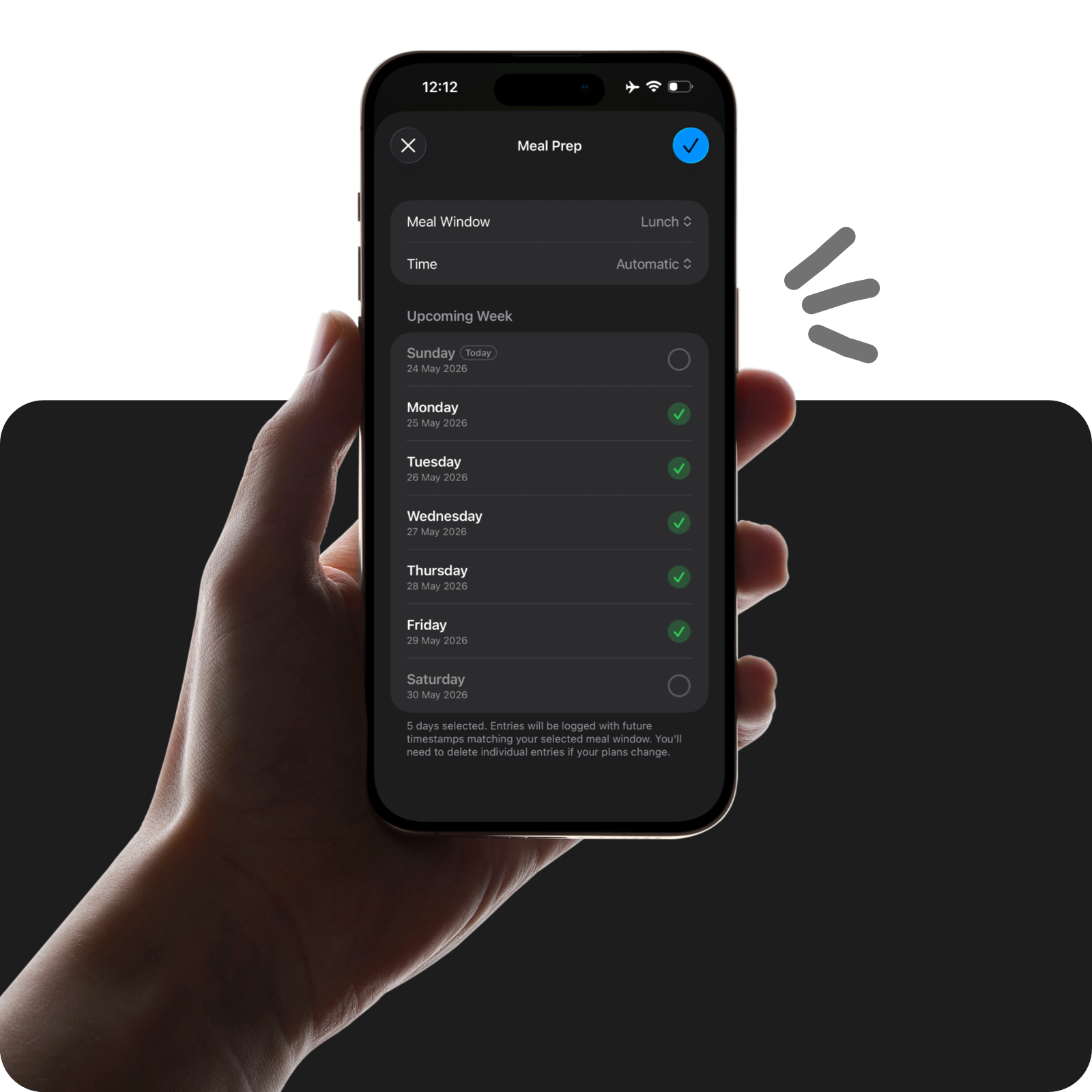 A hand holding an iPhone displaying multi-day meal selection sheet