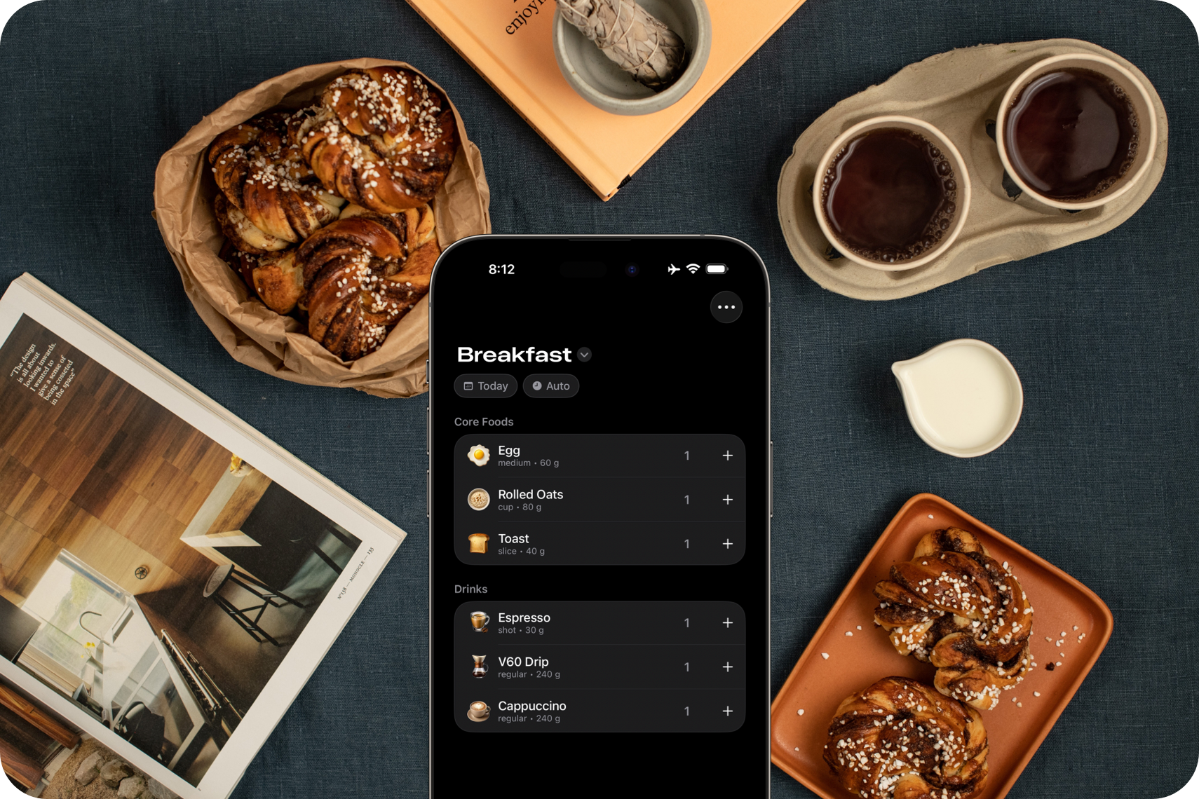 A hand holding an iPhone displaying a custom space for breakfast