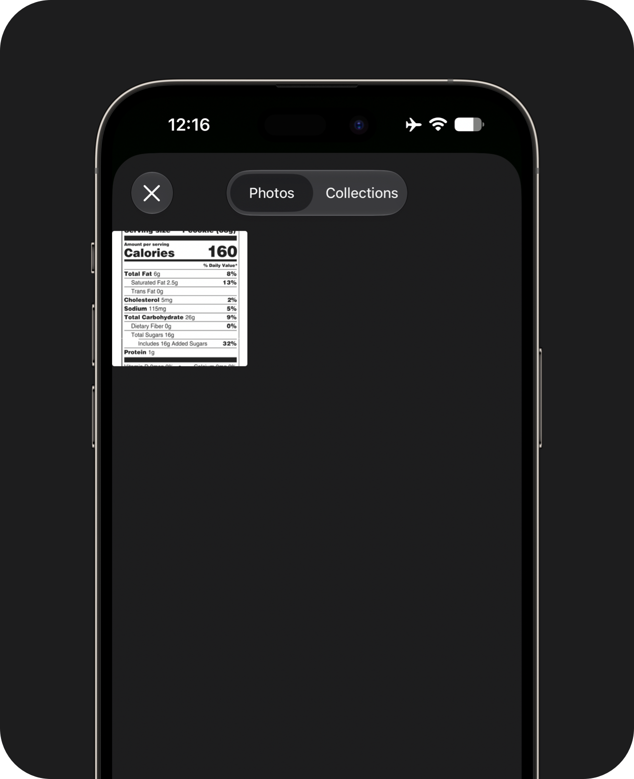 An iPhone showing photo library picker sheet